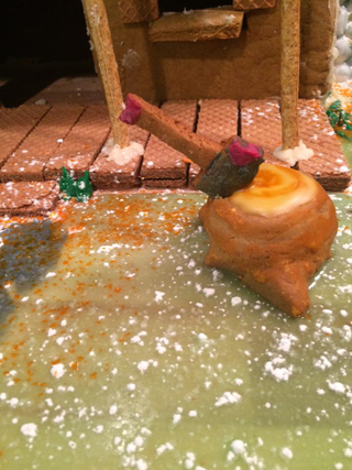 Illustration for article titled Amazing Ash vs Evil Dead Gingerbread House Is the Grooviest Reason for the Season